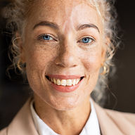 smiling-woman-in-business-attire-posing-confidentl-2024-10-03-18-00-58-utc.jpg