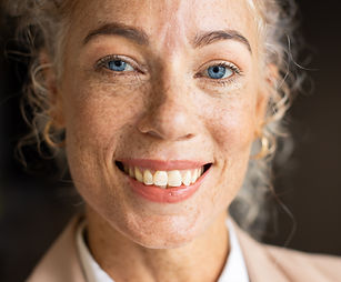 smiling-woman-in-business-attire-posing-confidentl-2024-10-03-18-00-58-utc.jpg