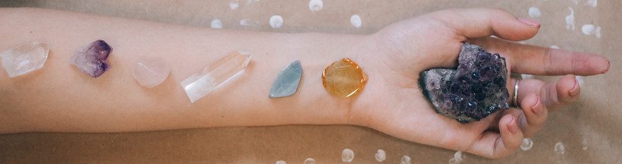 white-and-black-stone-on-person-arm-3611