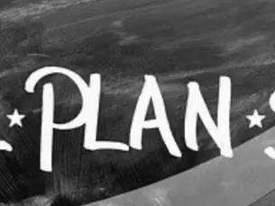 The word "PLAN" written in chalk