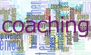 The word "Coaching" with adjectives filling the background