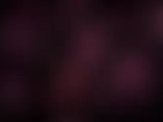 Tiny pink hearts of a black background