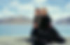 Ladakhi woman and kid with pangong lake and mountains in background