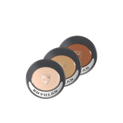 Three Kryolan makeup compacts show different shades for diverse skin tones.
