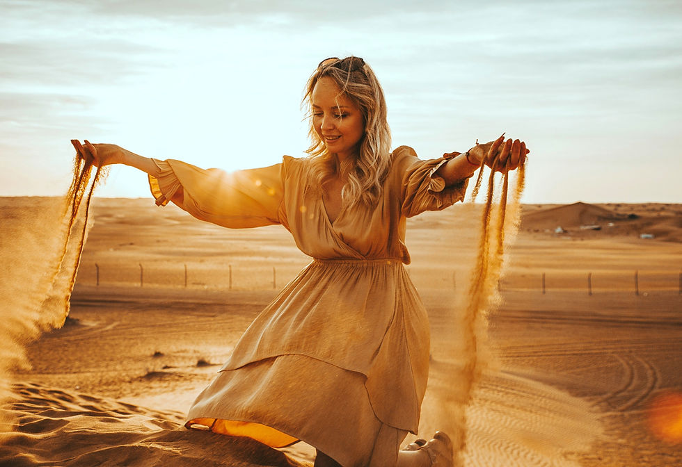 woman in the sand in the desert