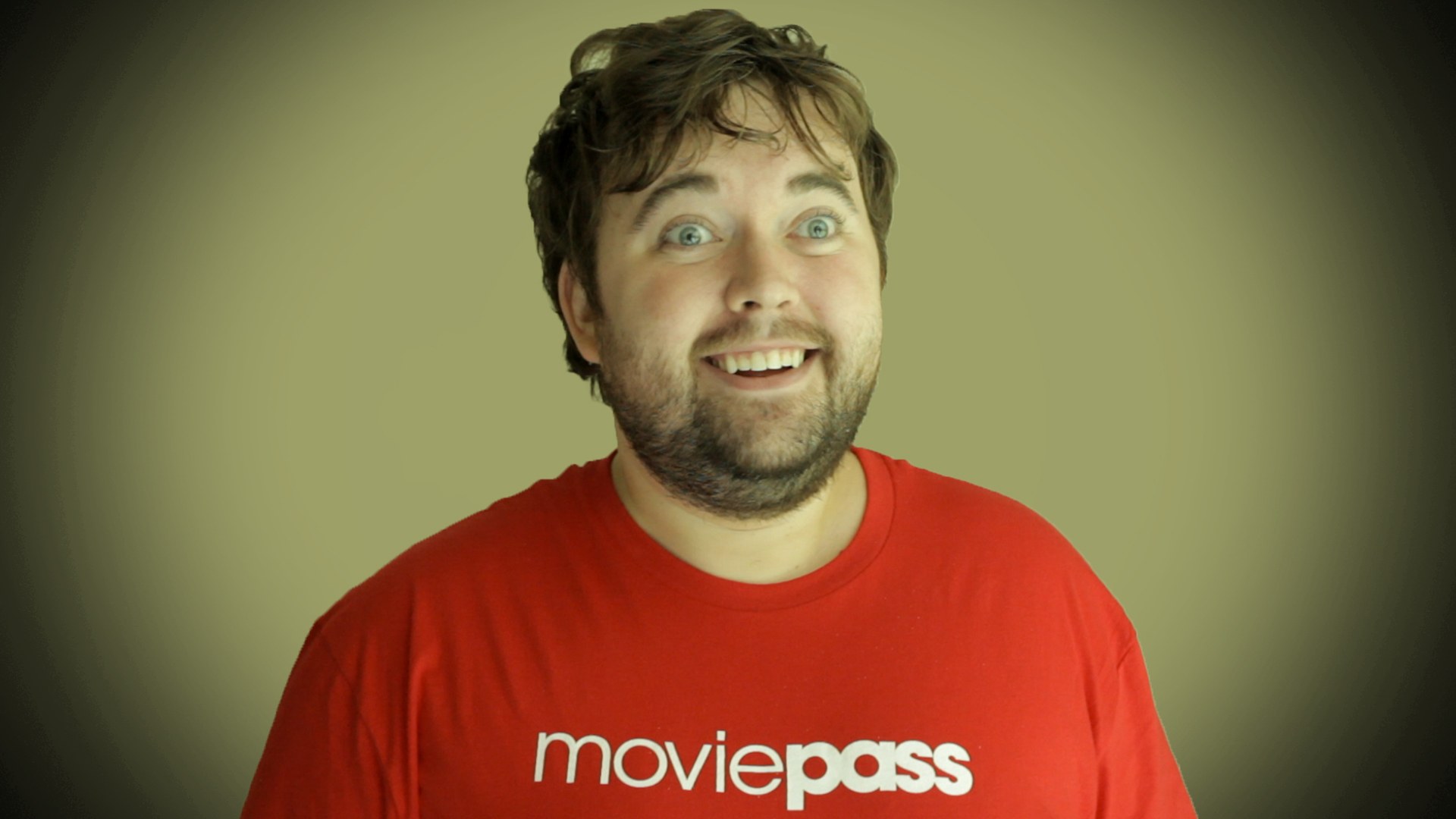 disheveled man with moviepass shirt in spotlight