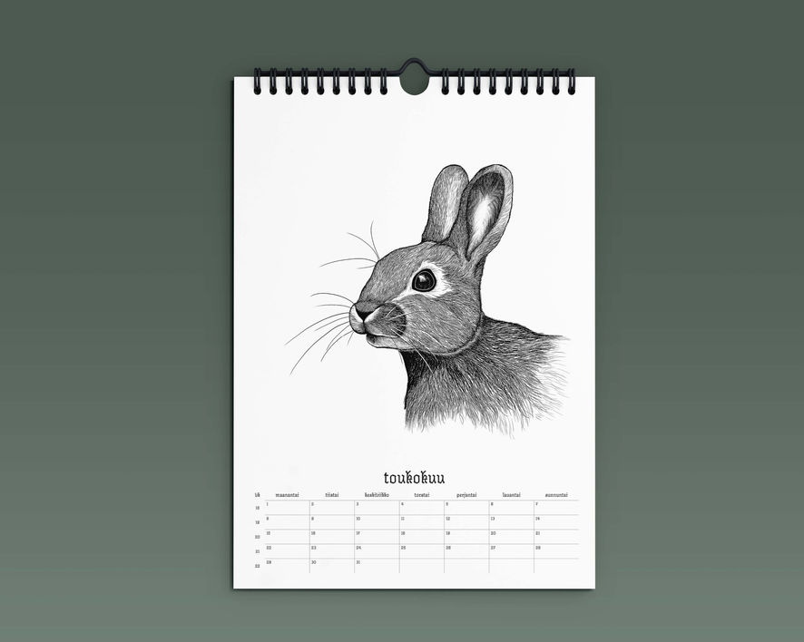 toukokuu_mockup.jpg, jänis, kalenteri, seinäkalenteri 2023, nina aitta, kuvitus, kuvittaja, taitto, graafinen suunnittelu