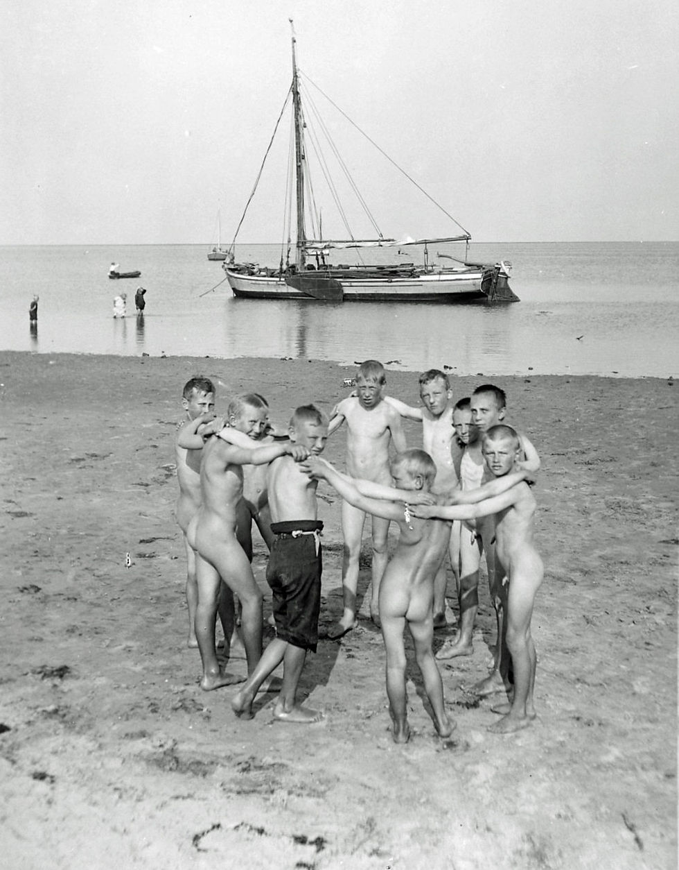 Children in Denmark playing on the beach in August 1901. Some are clothed, others are naked. No self-consciousness, no stigma around their natural form. Hjalmar Christian Louis Alstrup. Public Domain.