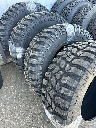 4 -33/12.5/18 mud champ tire set