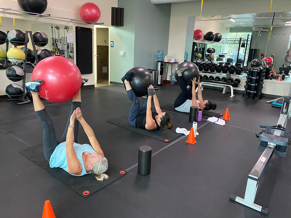 Eye-level view of a vibrant group fitness class in session