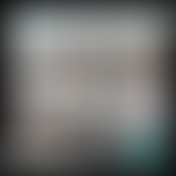 A kitchen backsplash made with large tile