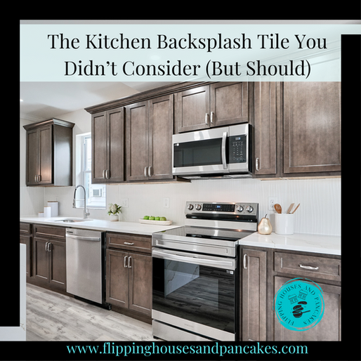 A kitchen backsplash made with large tile