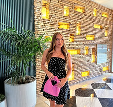 Mady Vivian in polka dot dress in Vegas resturant