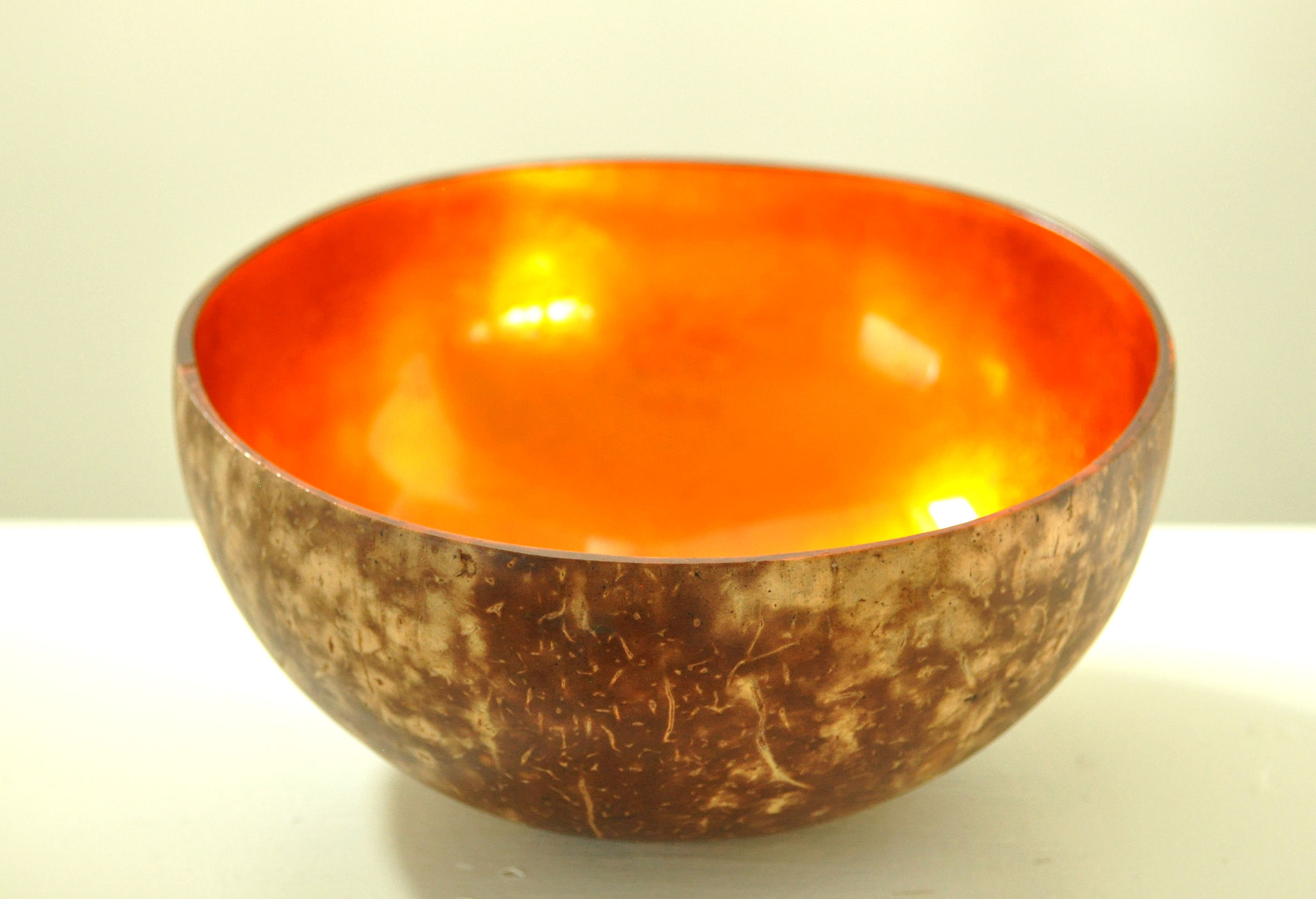 handcrafted coconut wood decorative round bowl coated with silver leaf orange