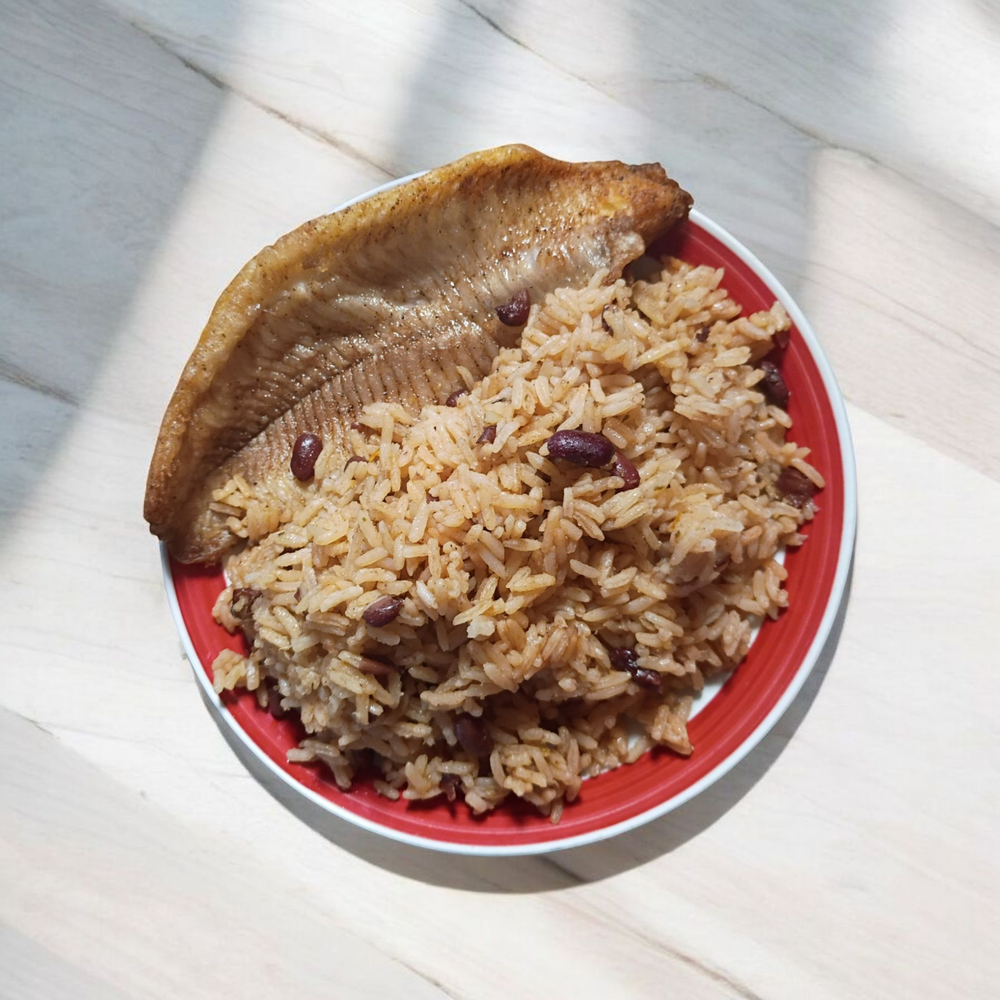 1 boneless catfish , rice and beans