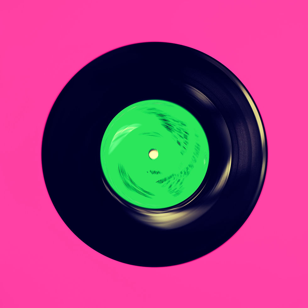 framed vinyl record wall art in pink and green