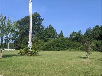 A nice sunny trailer park lot with space for planting