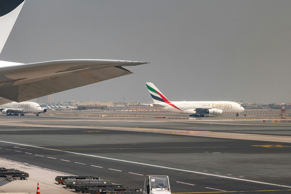 a large jetliner sitting on top of an airport tarmac