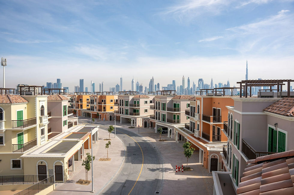 Low-rise Dubai residential community with the city skyline and Burj Khalifa behind