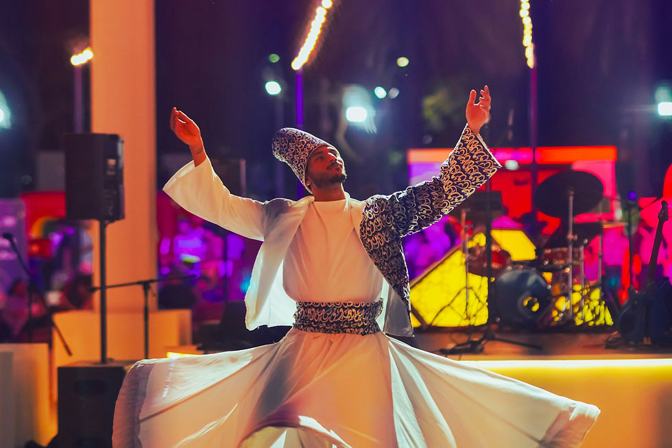 A sufi dervish spins while dancing.