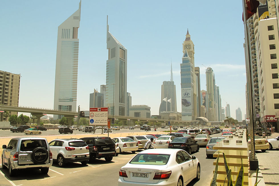 Emirates Towers and traffic on Sheikh Zayed Road, Dubai