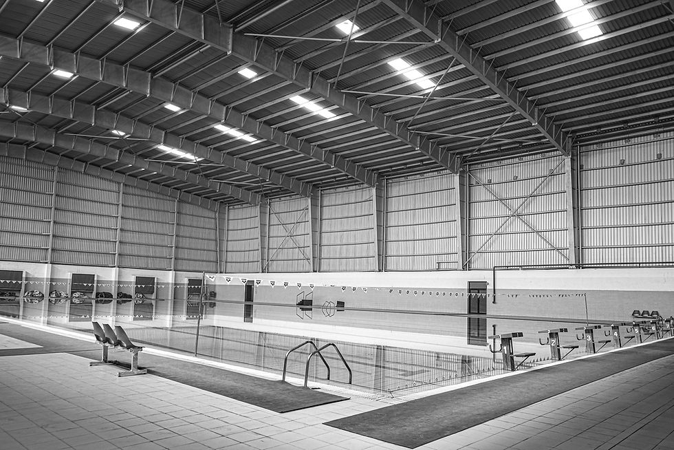 a large indoor swimming pool in a building