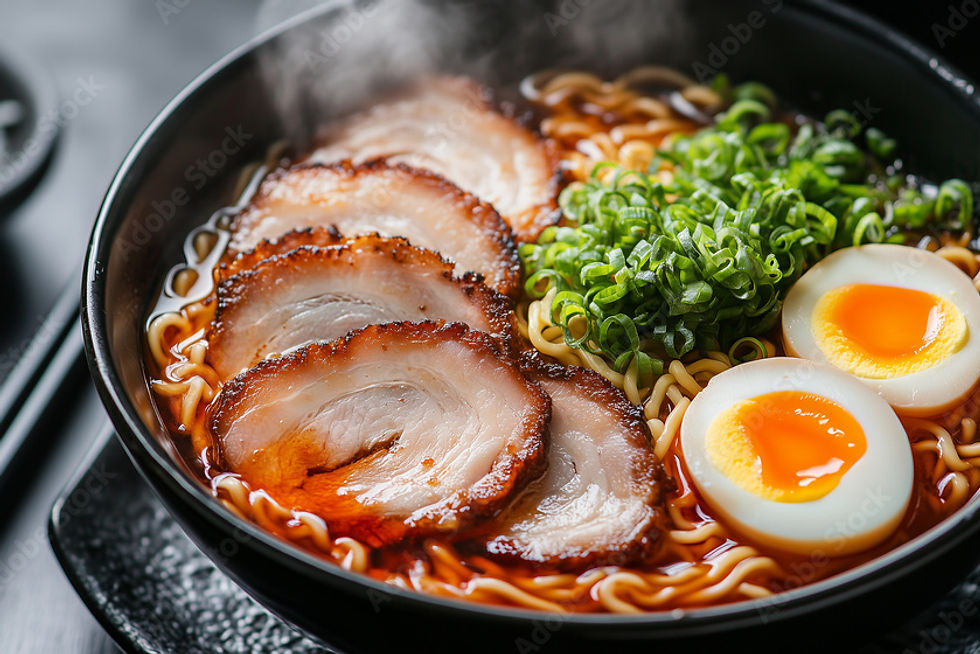 Steaming bowl of shoyu ramen with pork and soft-boiled egg, capturing ...