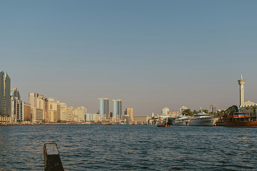 Dubai Creek and Deira waterfront with traditional dhows