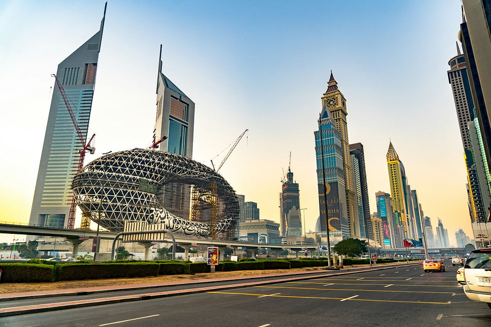 Dynamic view of Sheikh Zayed Road's futuristic skyline at sunset in Dubai