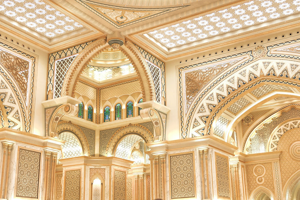 Intricate architecture inside a grand, ornate building.