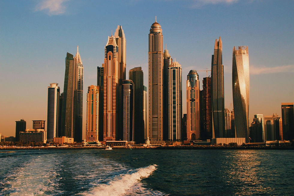 Dubai Marina skyline from the water at golden hour