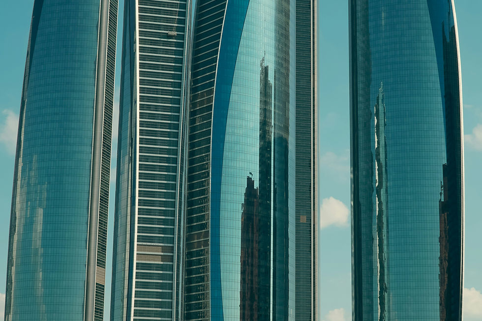 A group of tall buildings sitting next to each other