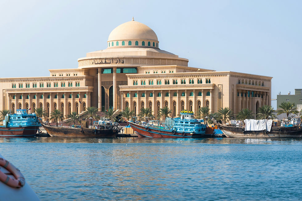 a large building sitting on top of a body of water