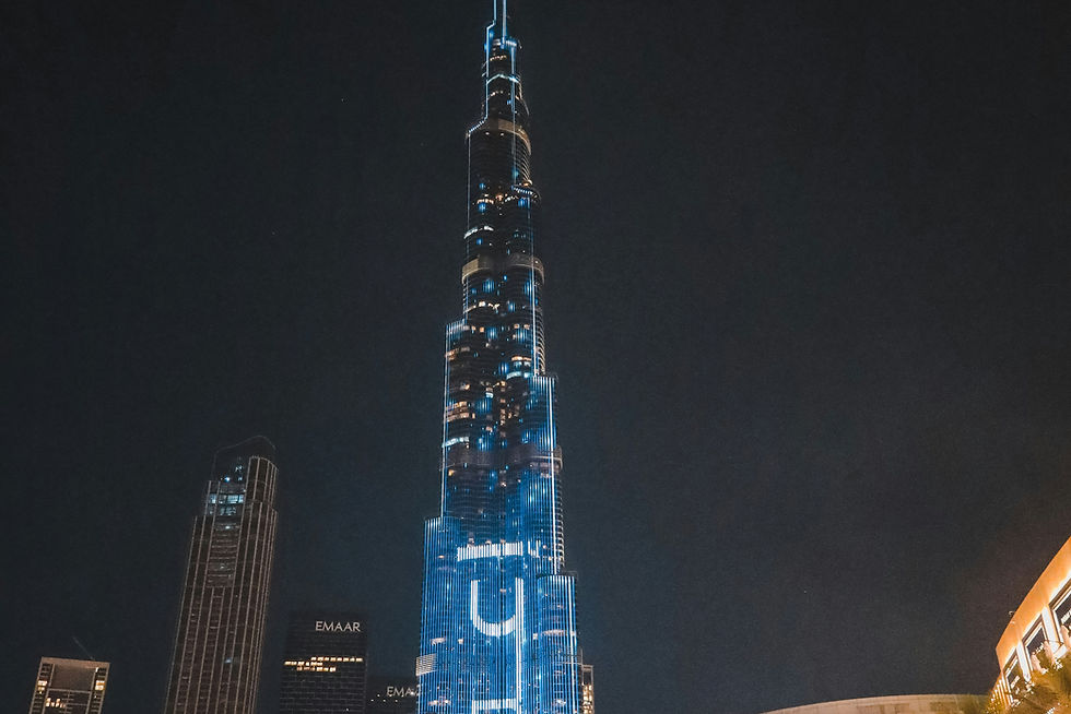 a very tall building lit up at night