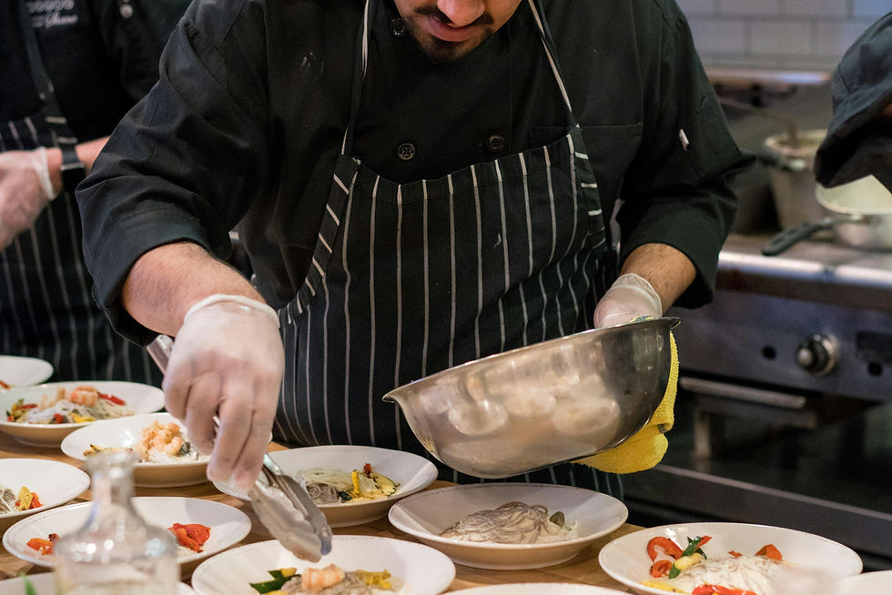 man cooking in kitchen