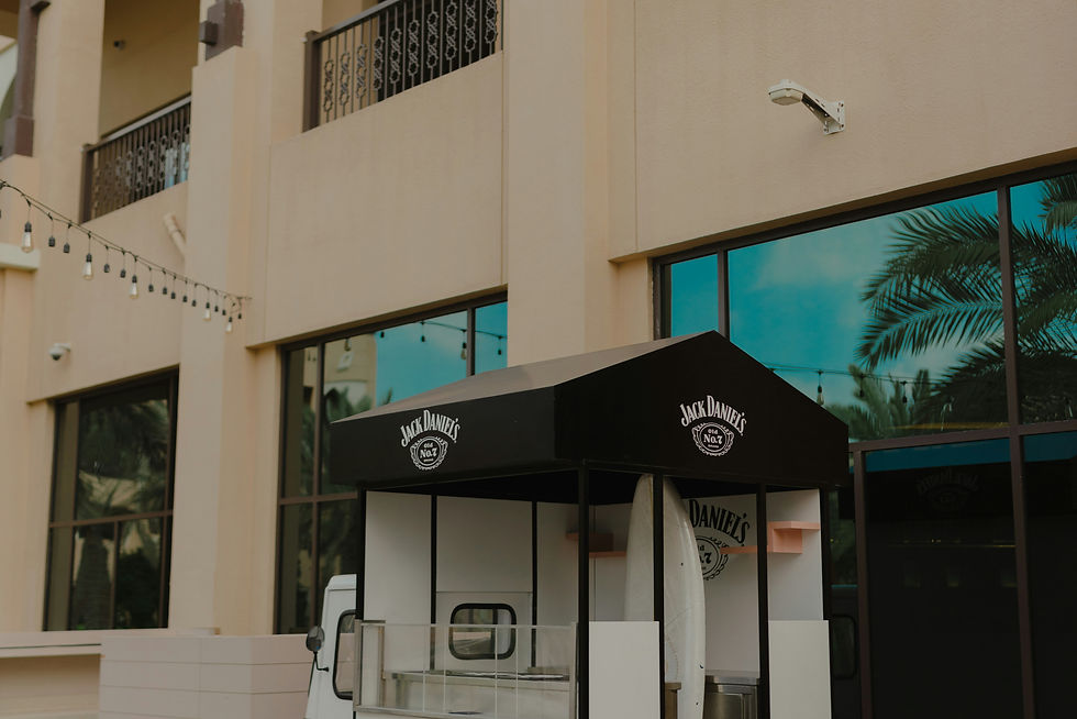 a small ice cream cart parked in front of a building