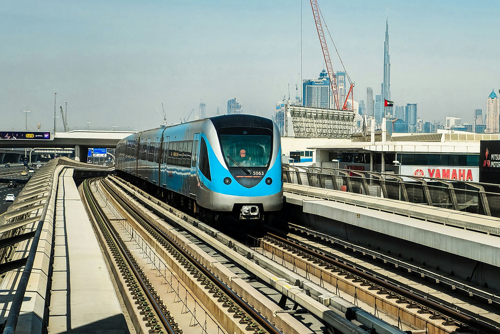 A train is traveling on tracks in dubai