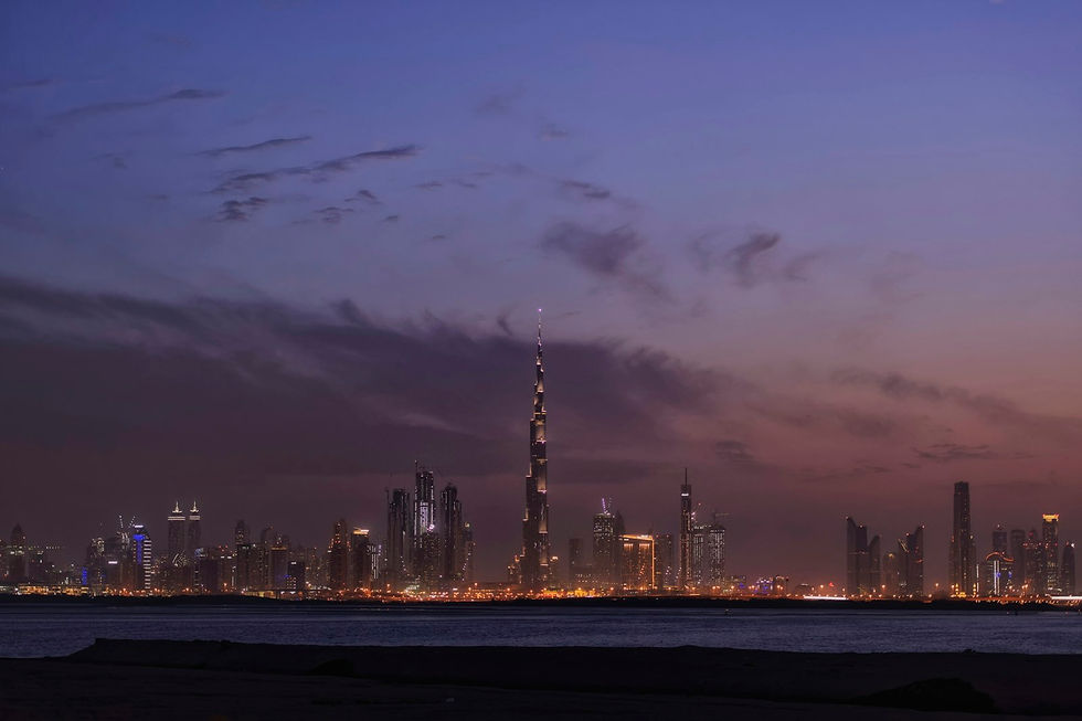 Dubai Marina and Downtown at blue hour — representative of the panoramas from Palm and Sheikh Zayed Road rooftop venues.