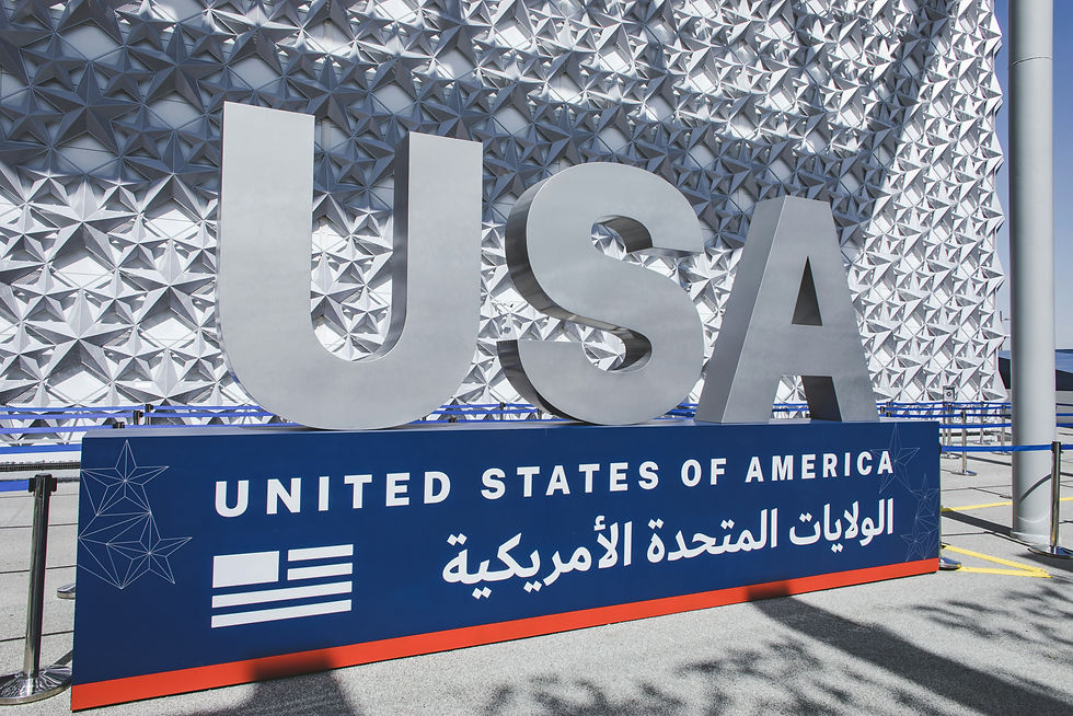 the united states of america sign in front of a building