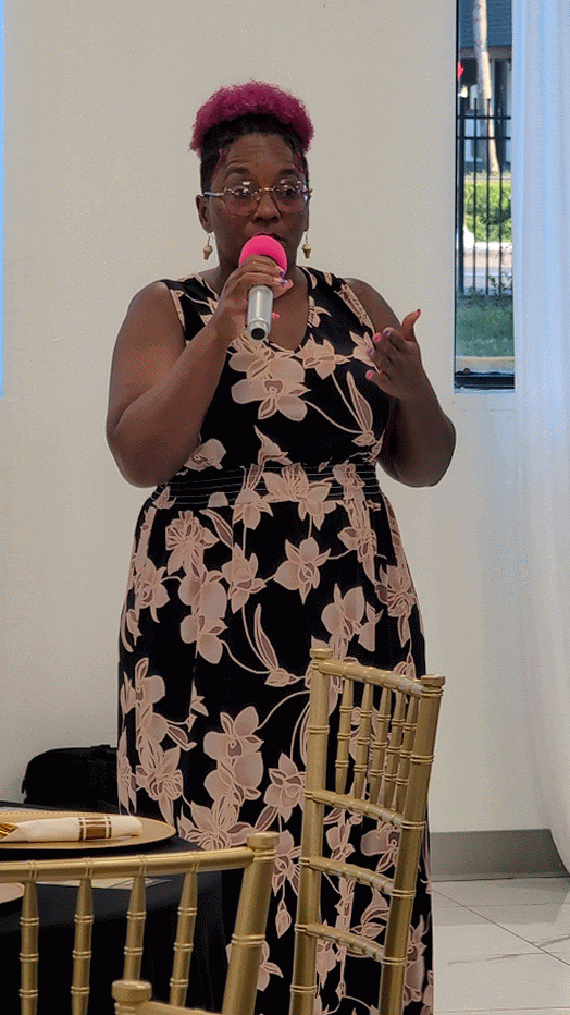 Tina in action discussing financial literacy.