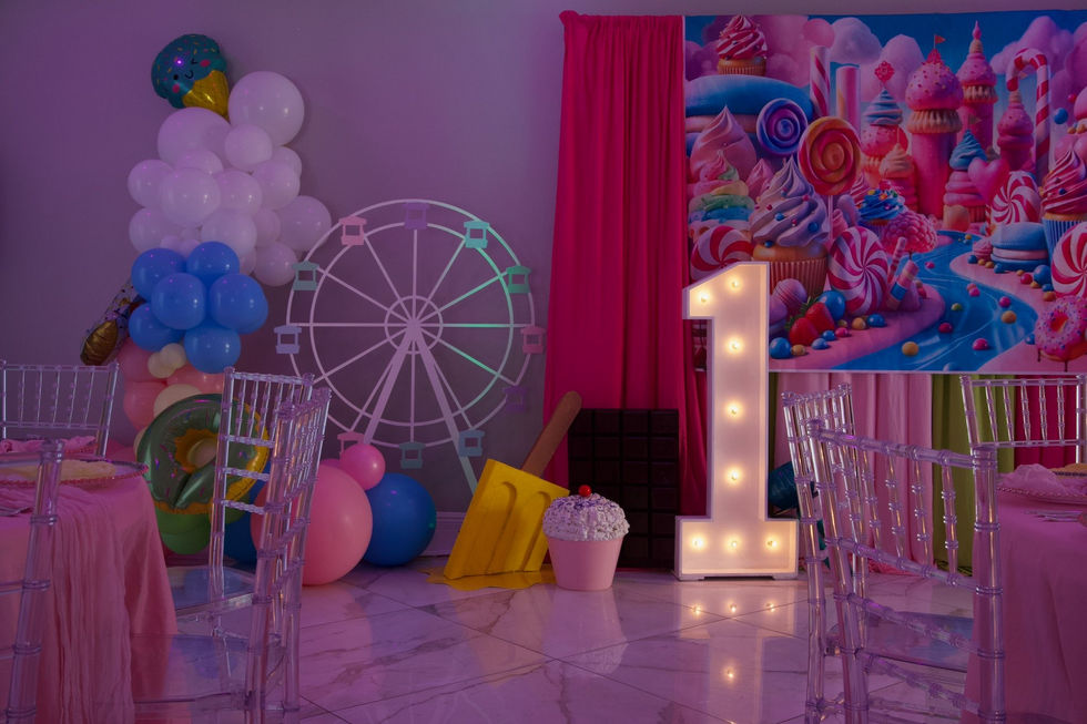 Colorful birthday party setup with balloons and decorations.
