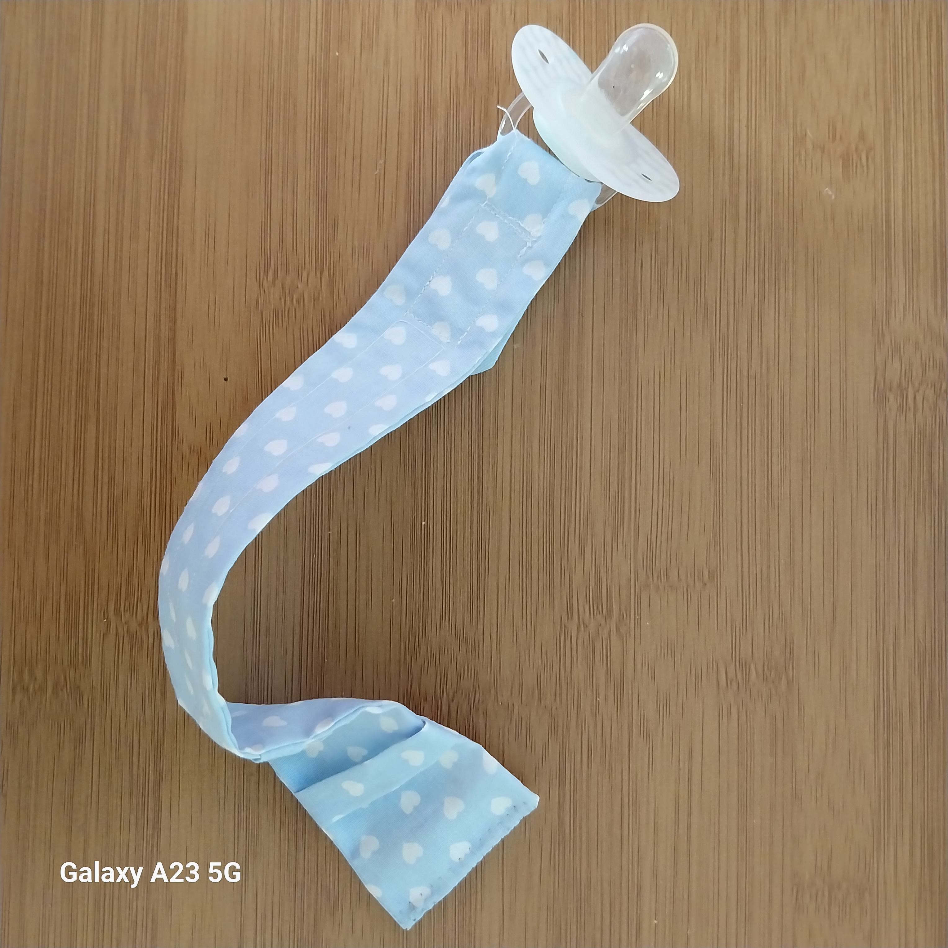 Bracelet montre porte sucette nuit 