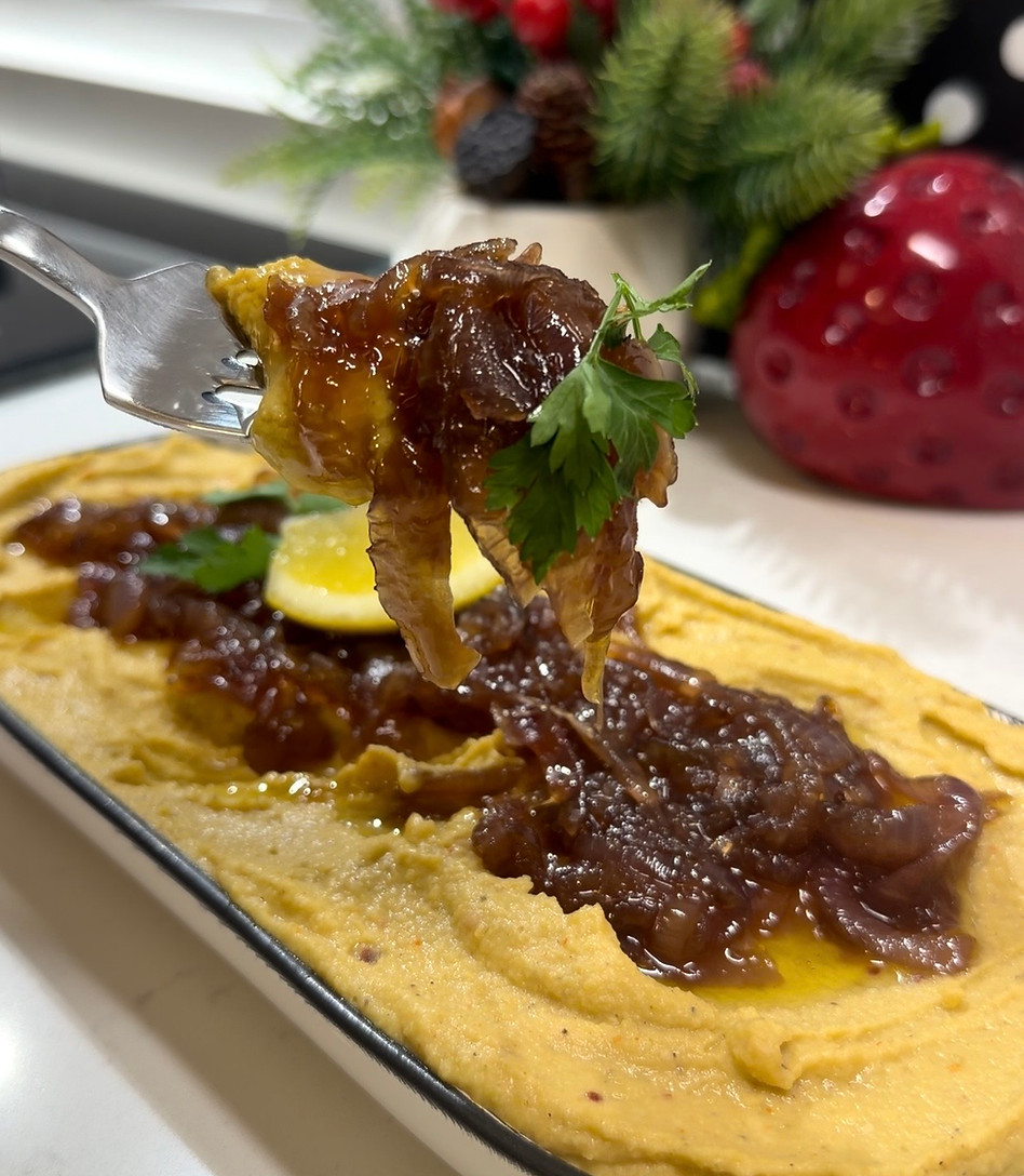 creamy hummus with caramelized onions