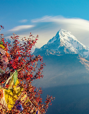 Snow-capped Himalayan mountains representing Nepal adventure travel, trekking and natural beauty