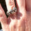 Thumbnail: model wearing three signature skull rings on 2 mm band