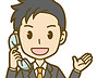 電話で説明する社員