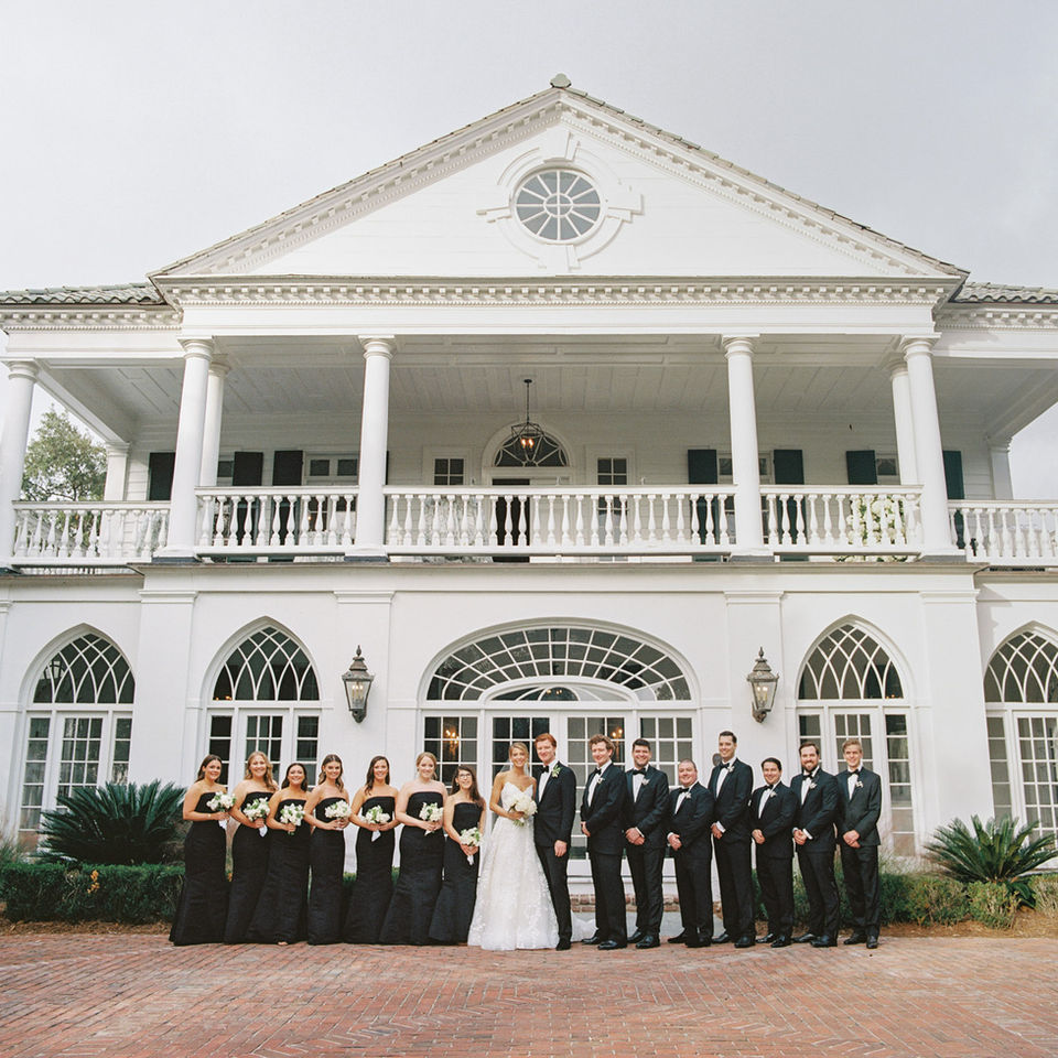 A film wedding photographer documents, in editorial style, this December wedding at Lowndes Grove in Charleston, SC. 