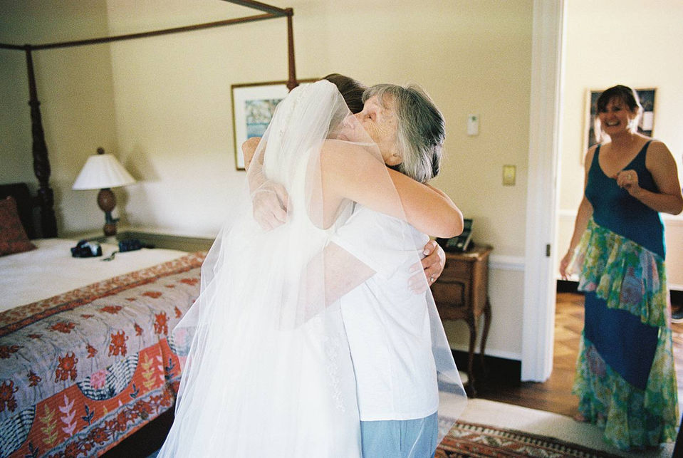 35mm film, photographed documentary style, at a summer wedding in Nashville, Tennessee. 