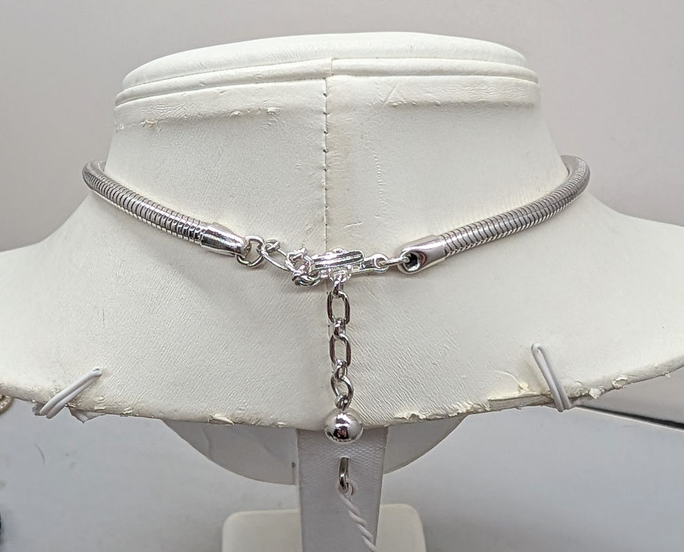 Thumbnail: Vintage 1970s Signed Crown Trifari Rhodium Plated Textured O Pendant Necklace