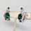 Thumbnail: Vintage 1960s Signed Kramer Plated Faux-Emerald & Clear Rhinestone Clip Earrings